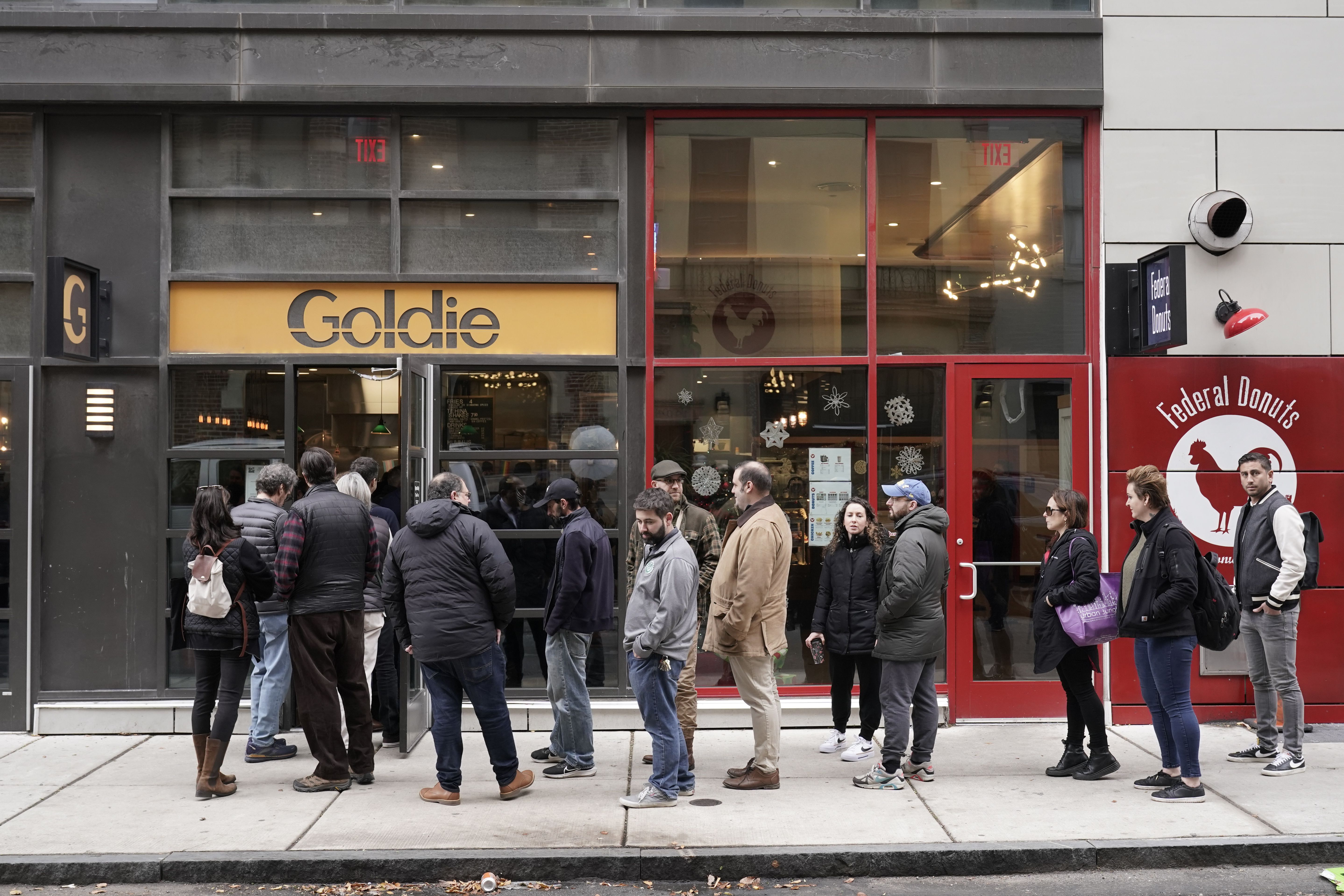 Customers line up for lunch at the Goldie falafel restaurant in Philadelphia today. 