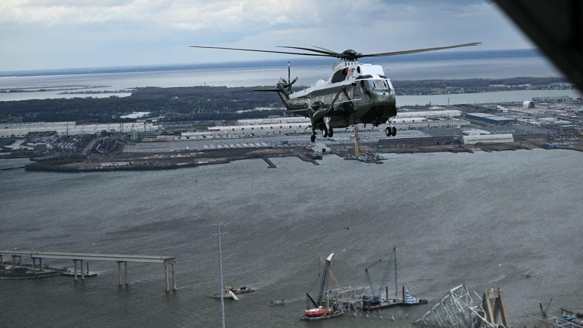 Marine One with US President Joe Biden onboard, makes an aerial tour of the collapsed Francis Scott Key Bridge