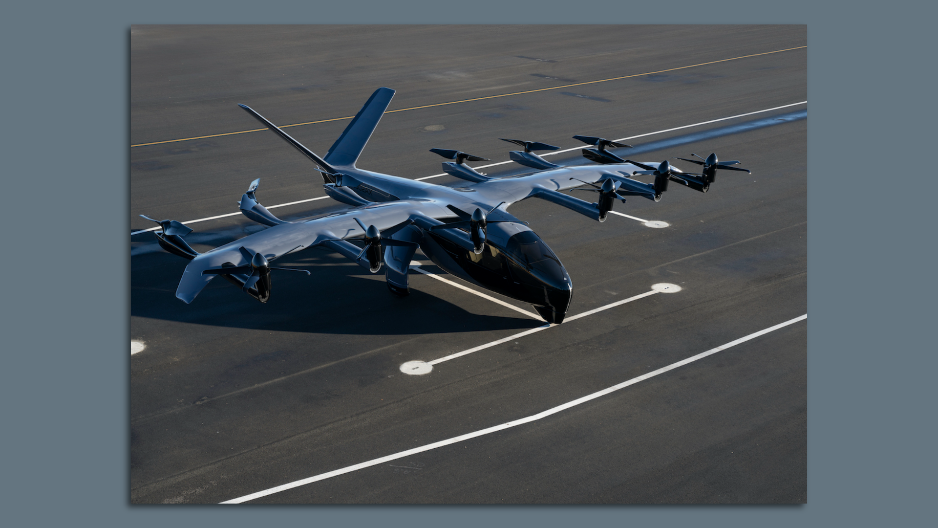 Image of Archer's electric vertical takeoff and landing aircraft on an airport tarmac. 