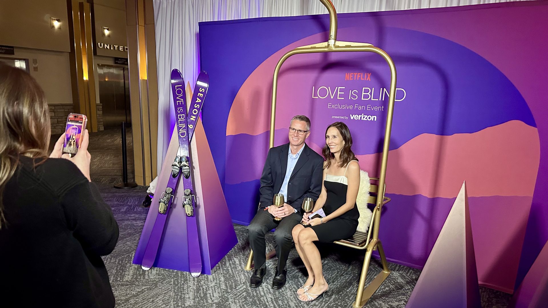 "Love is Blind" fans pose for photos at a reunion episode watch party Wednesday at Mile High Stadium. Photo: John Frank/Axios