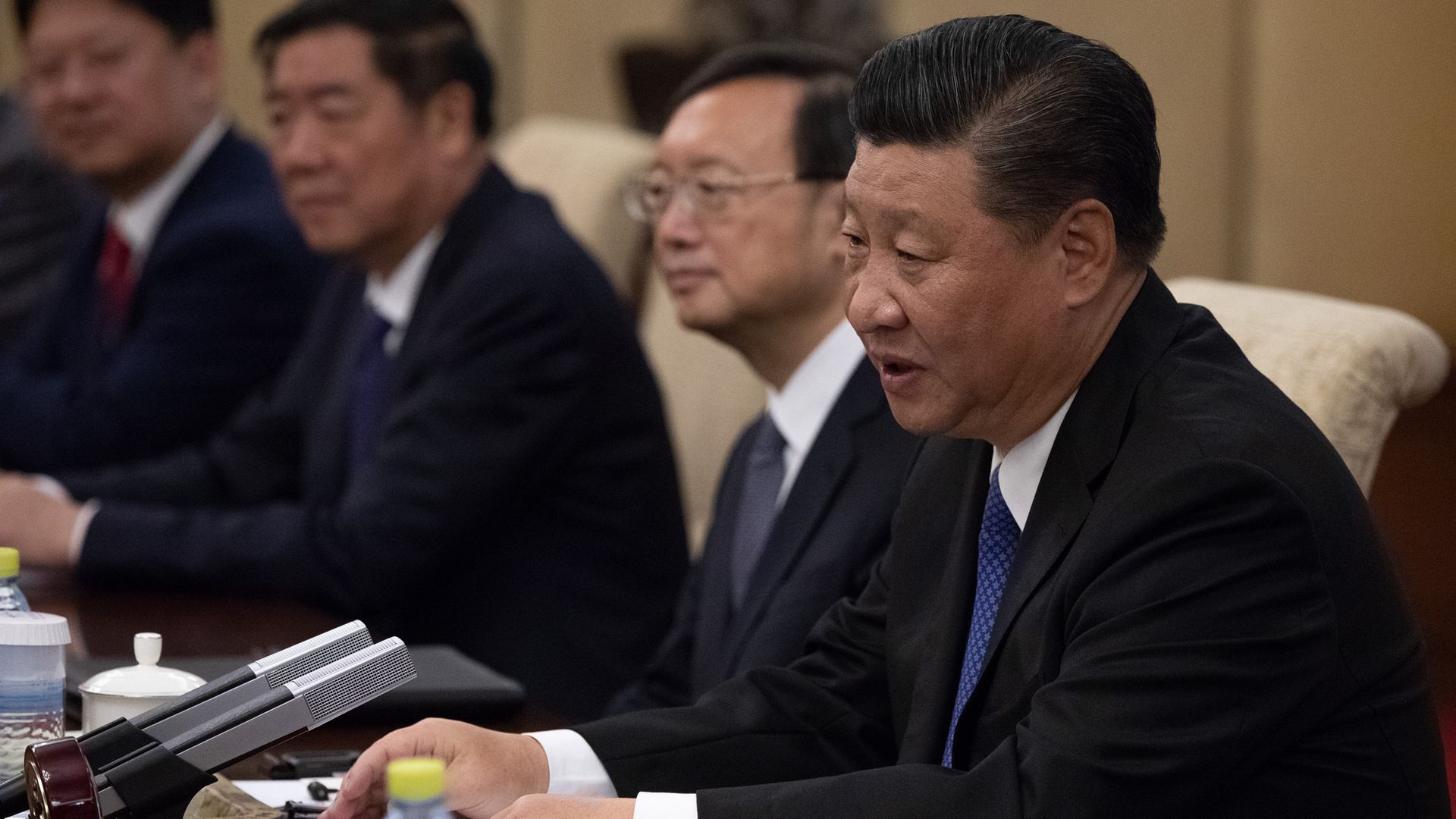 Chinese President Xi Jinping (R) speaks to Malaysian Prime Minister Mahathir Mohamad (not pictured) during their meeting at Diaoyutai State Guesthouse on August 20 2018 in Beijing, China.
