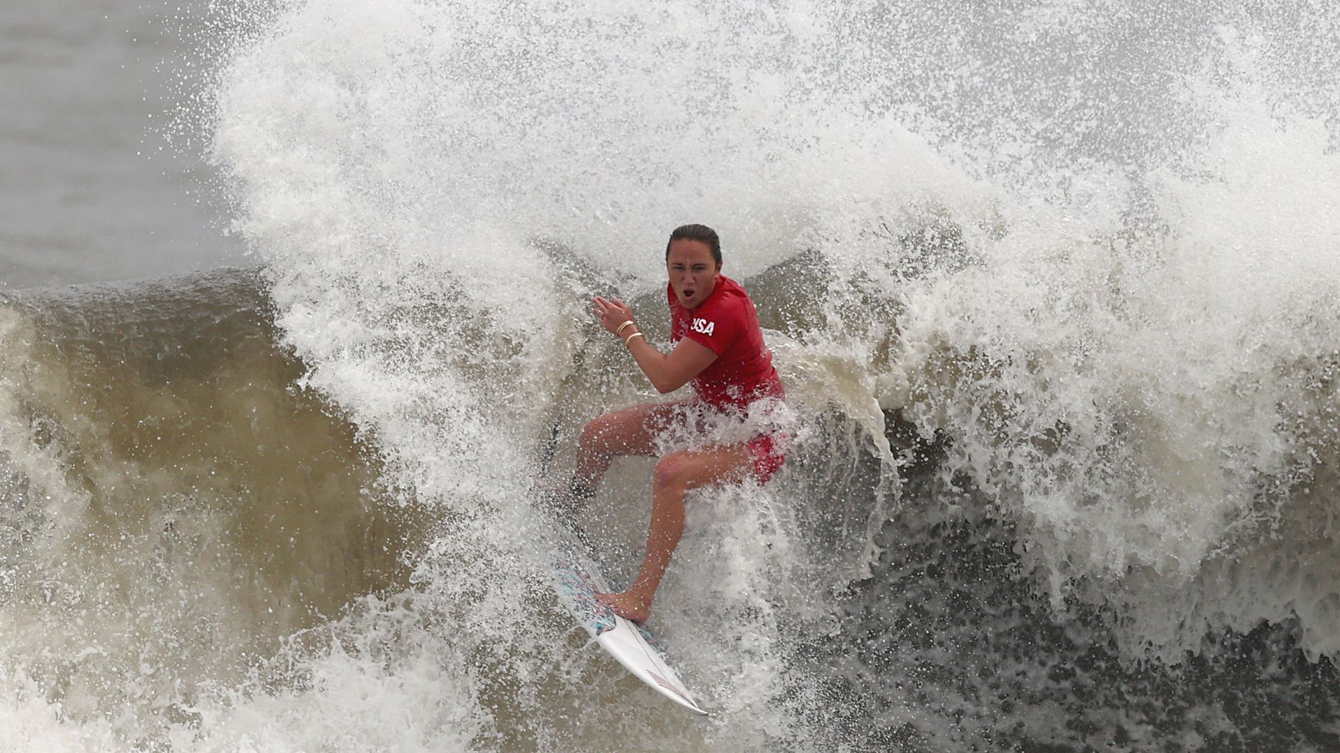  Carissa Moore of Team United States surfs during the women's Quarter Final on day four of the Tokyo 2020 Olympic Games at Tsurigasaki Surfing Beach on July 27, 2021 in Ichinomiya, Chiba, Japan.