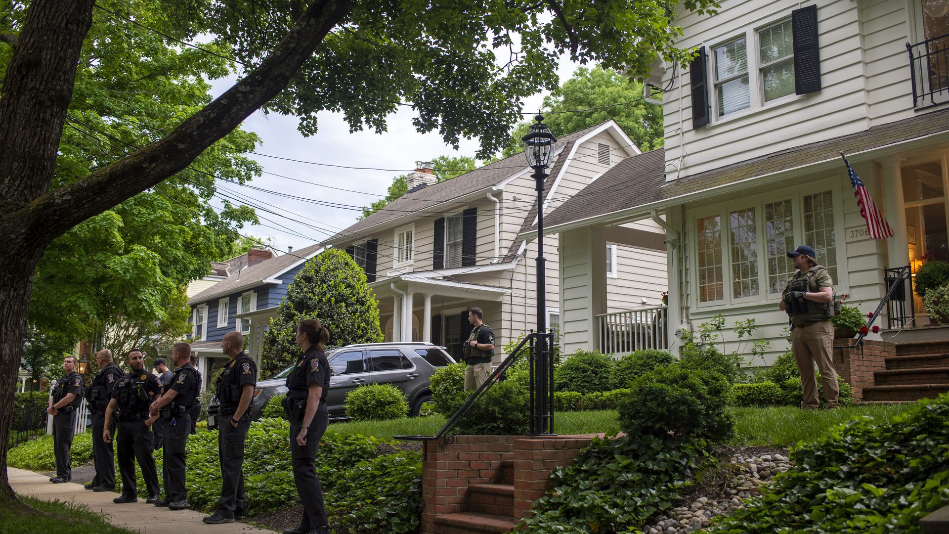 Police officers  outside Supreme Court Justice Brett Kavanaugh's home in Chevy Chase, Maryland, on June 8.
