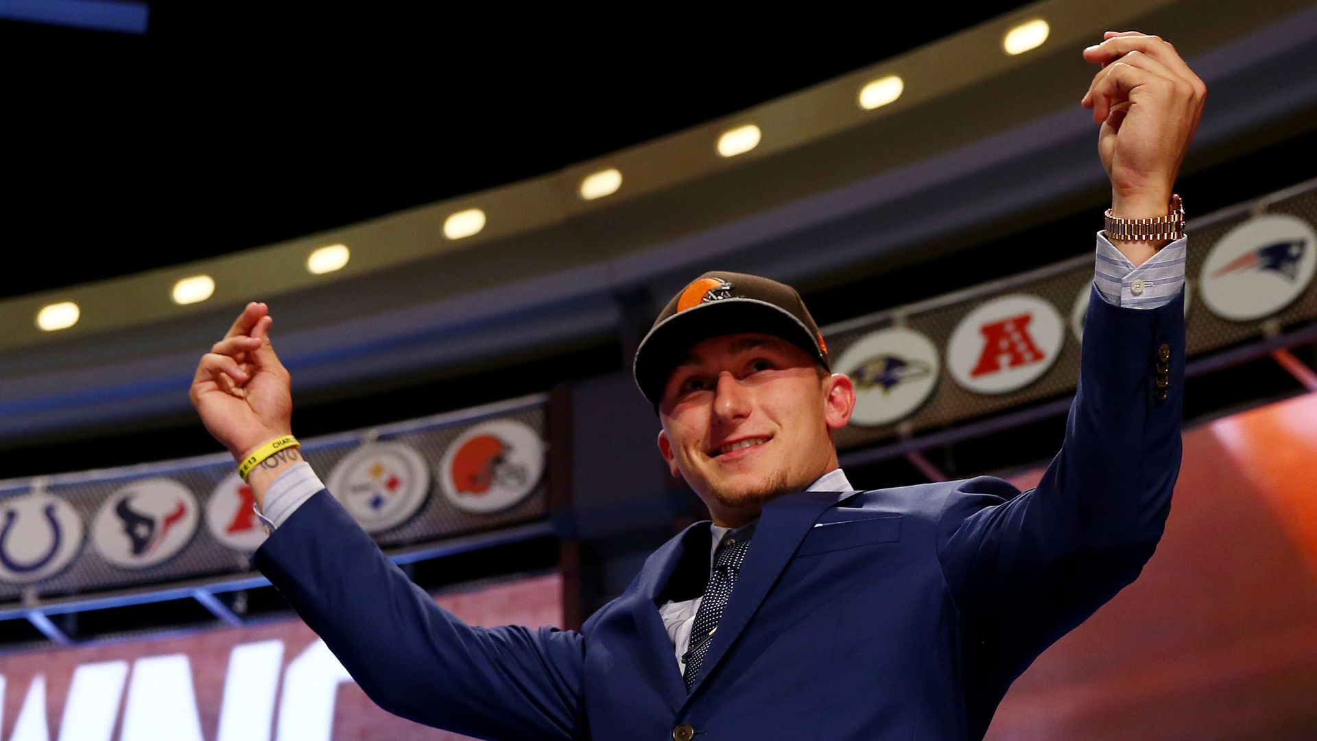 Johnny Manziel takes the stage at the 2014 NFL draft. 