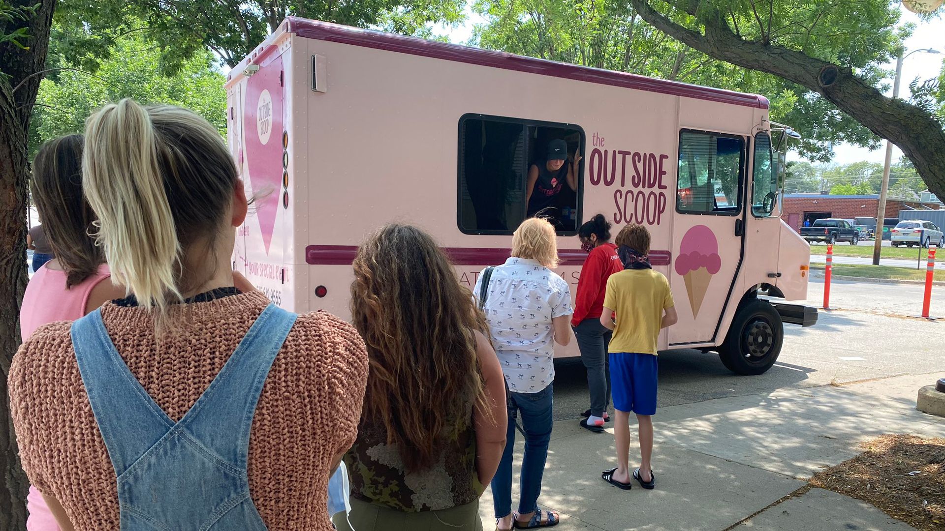 People waiting in line for Outside Scoop
