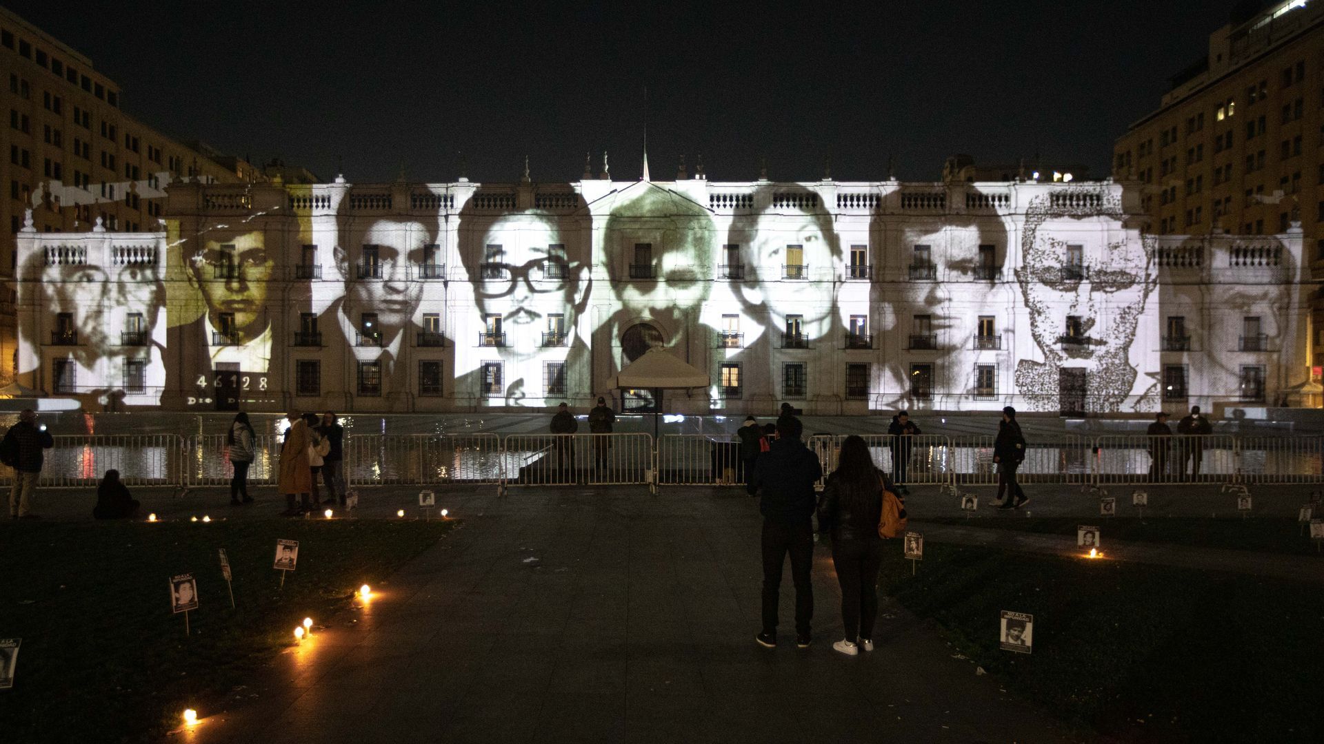 images portraying victims of the Augusto Pinochet dictatorship projected onto the Palacio de La Moneda to mark the commemoration of the International Day of the Disappeared in Santiago, Chile, on Aug. 30. Photo: Lucas Aguayo Araos/Anadolu Agency via Getty Images