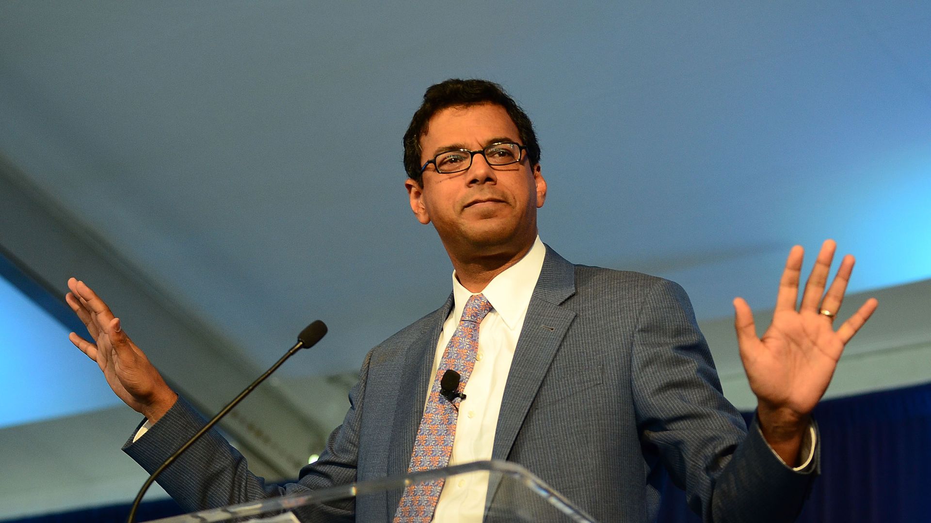 Atul Gawande speaks at a lectern