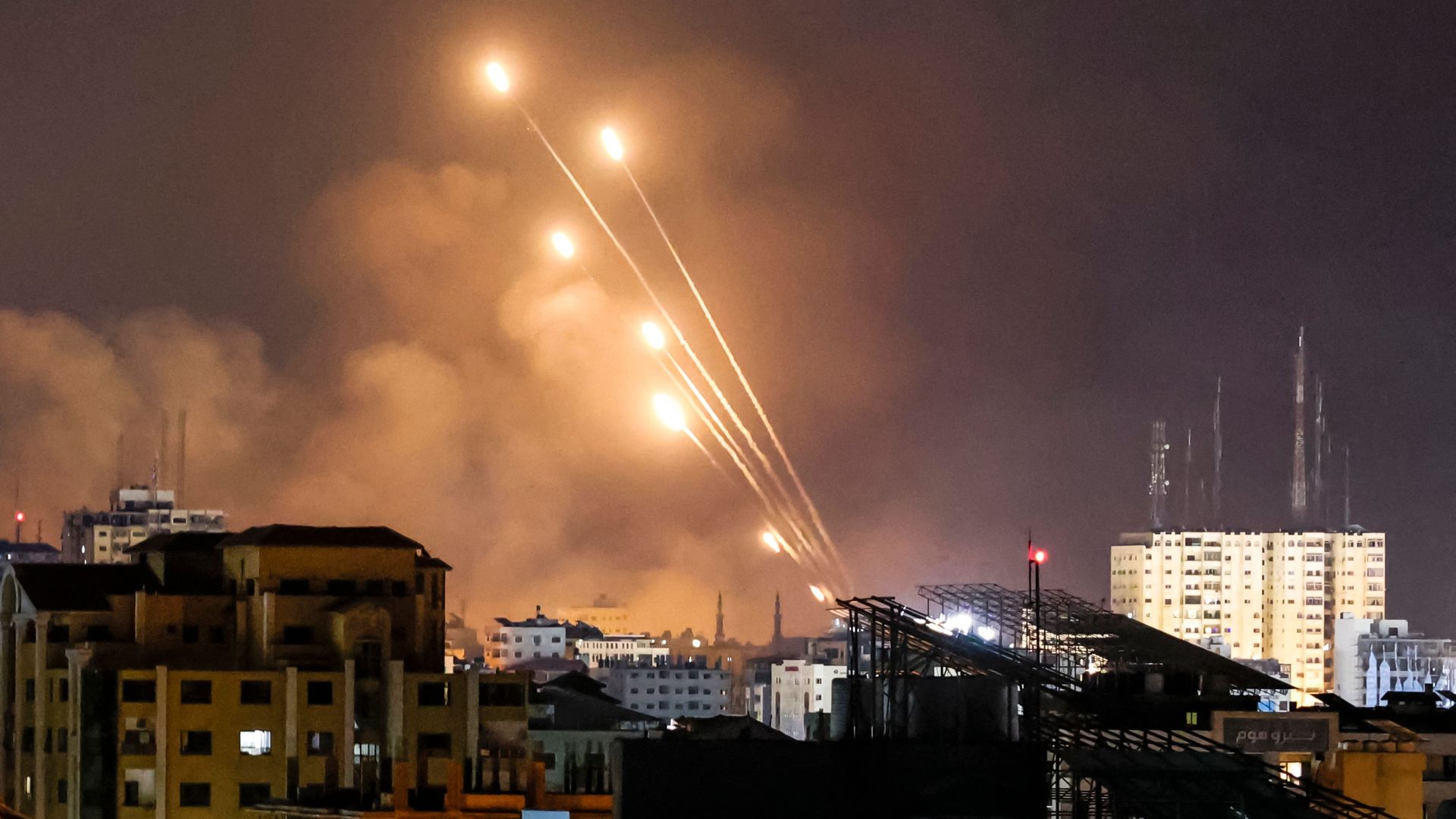 Photo of rockets hurled into the night sky