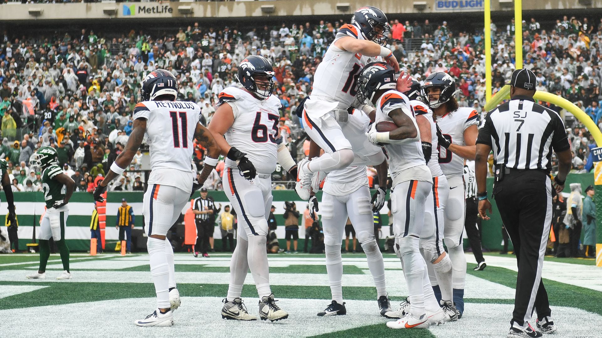 EAST RUTHERFORD, NEW JERSEY - SEPTEMBER 29: Courtland Sutton #14 of the Denver Broncos celebrates with Bo Nix #10 of the Denver Broncos after scoring a touchdown during the third quarter against the New York Jets at MetLife Stadium on September 29, 2024 in East Rutherford, New Jersey. (Photo by Kath
