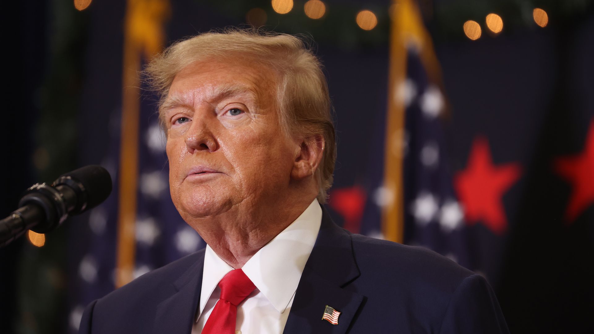 Republican presidential candidate and former U.S. President Donald Trump looks on during a campaign event on December 19, 2023 in Waterloo, Iowa