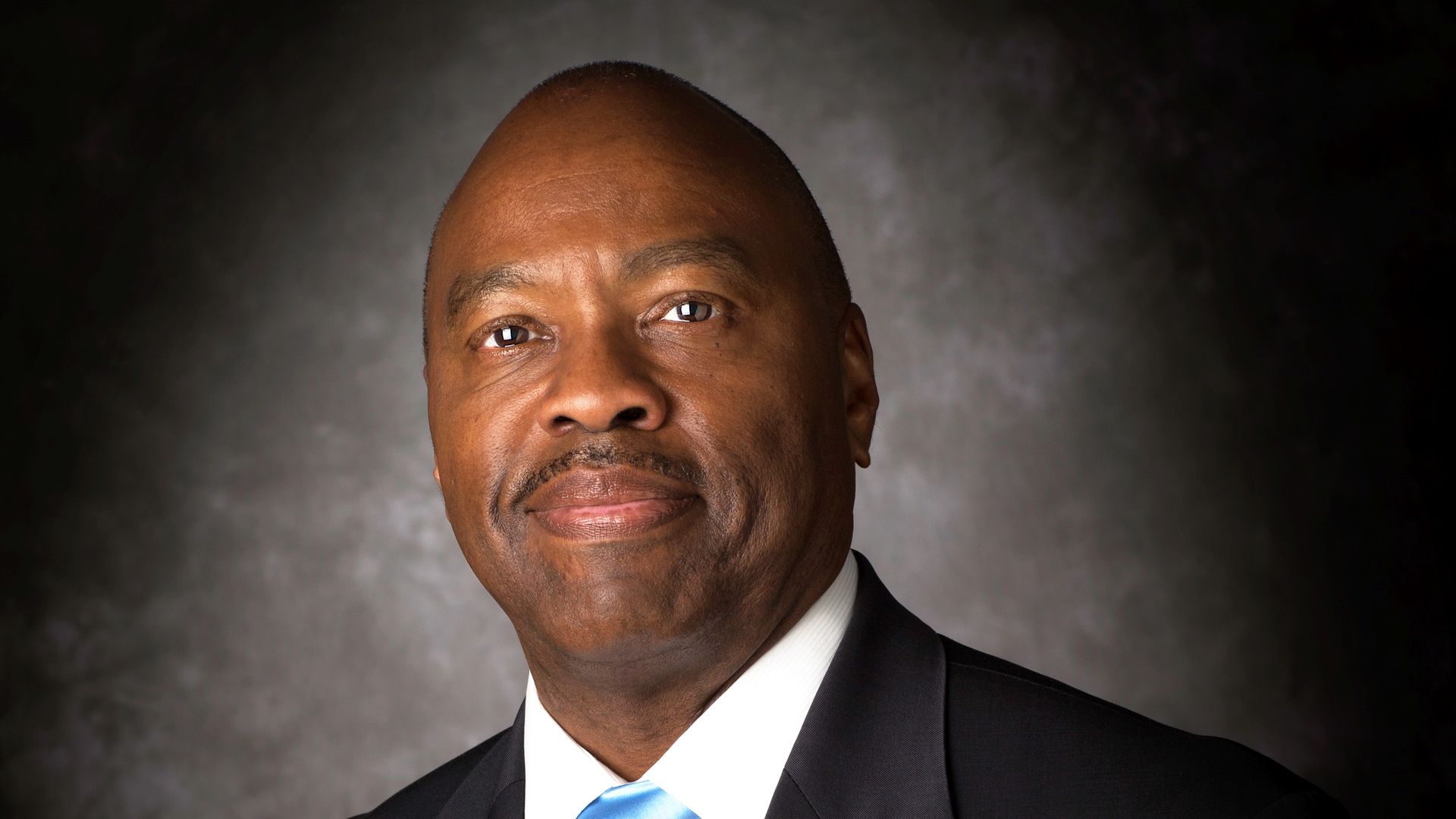 A headshot of Phillip Washington