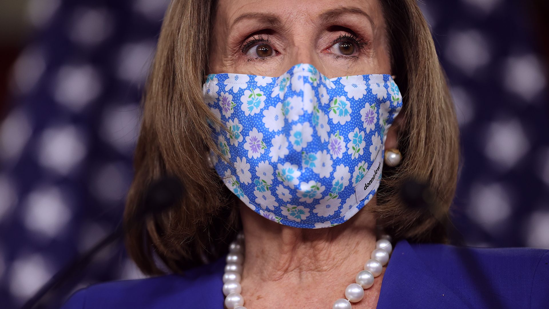 U.S. House Speaker Nancy Pelosi (D-Calif.) wears a protective mask during a news conference at the U.S. Capitol in Washington, D.C.