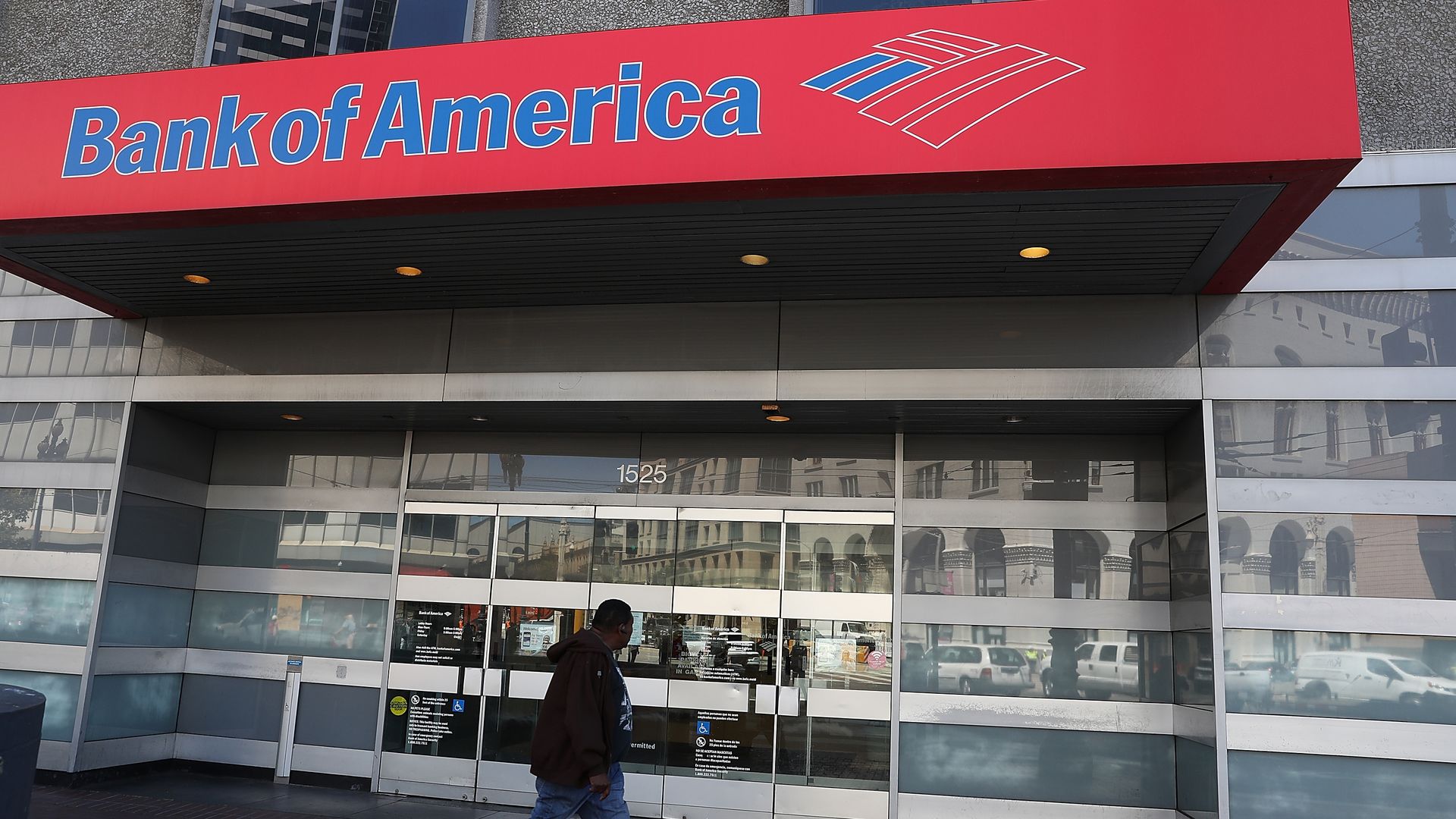A pedestrian walks by a Bank of America office on July 16, 2018 in San Francisco, California.