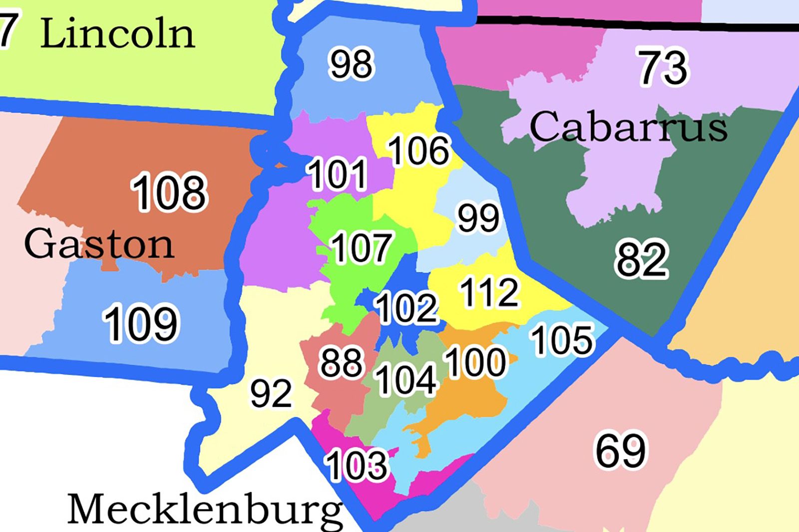 Colorful map section showing numbered districts within counties labeled Gaston, Mecklenburg, Lincoln, and Cabarrus, separated by thick blue boundaries with various pastel and bright colors.