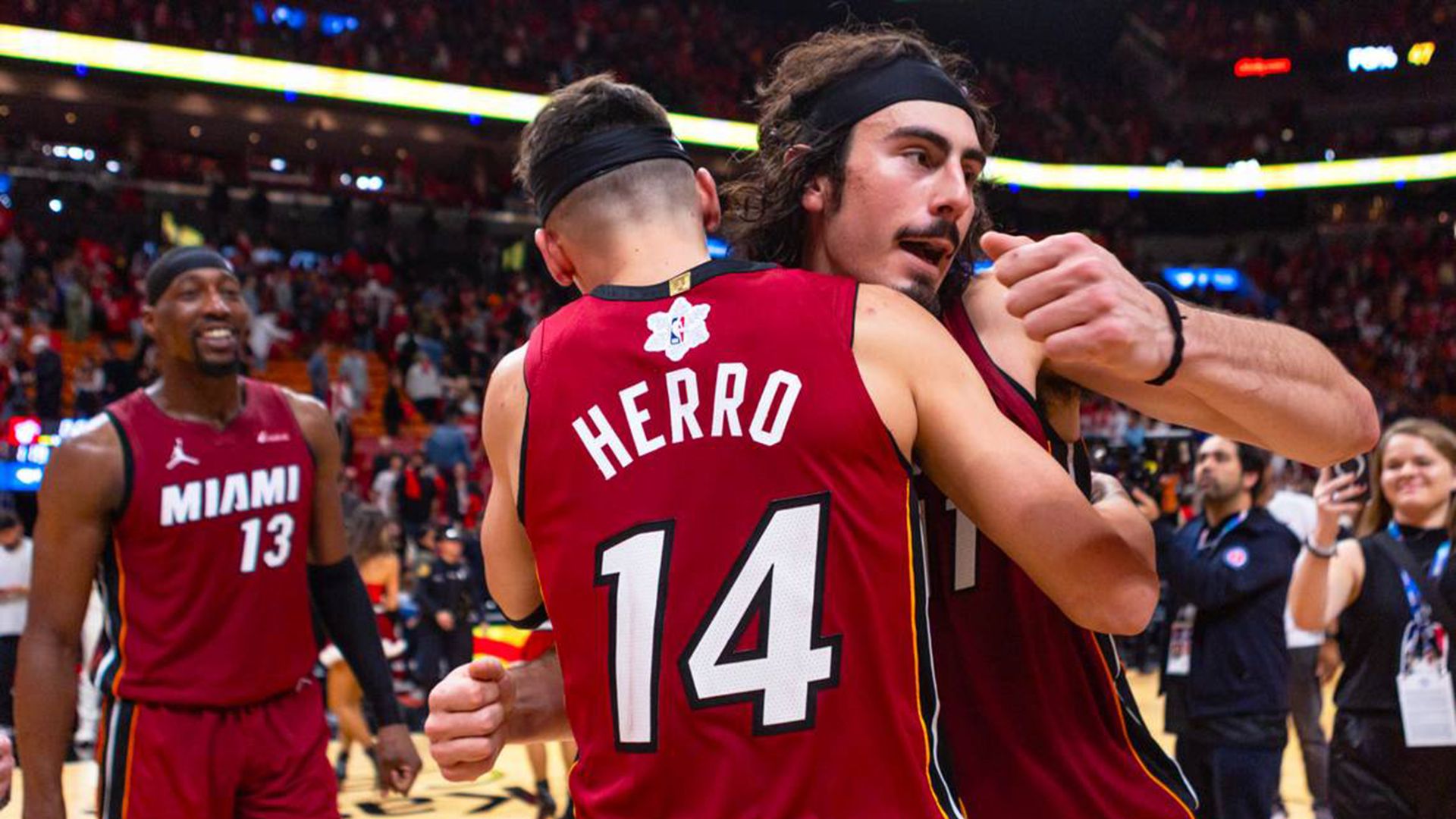 Miami Heat guard Jaime Jaquez Jr. (11) reacts with teammate Tyler Herro (14) after defeating the Philadelphia Sixers 119-113 at Kaseya Center in Miami on Monday, Dec. 25, 2023. 