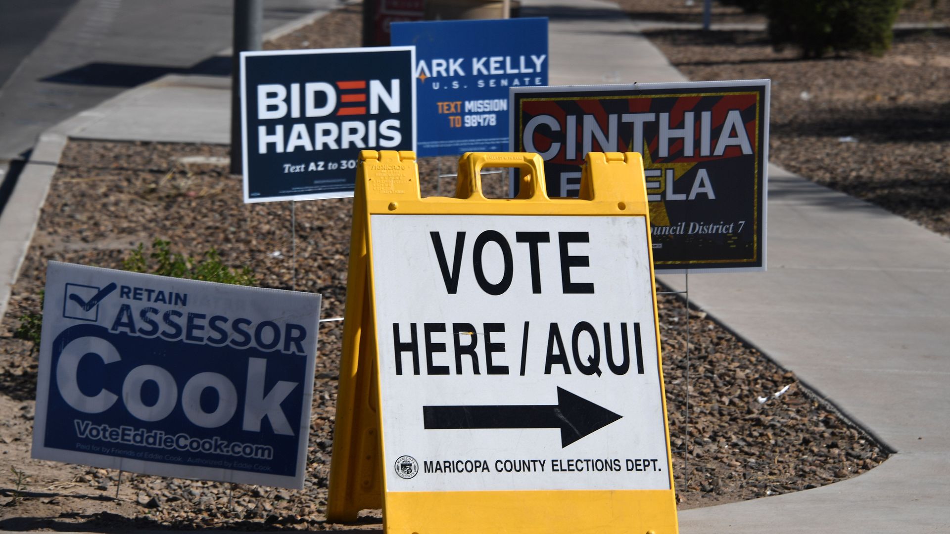 A sign points the way to an early voting location