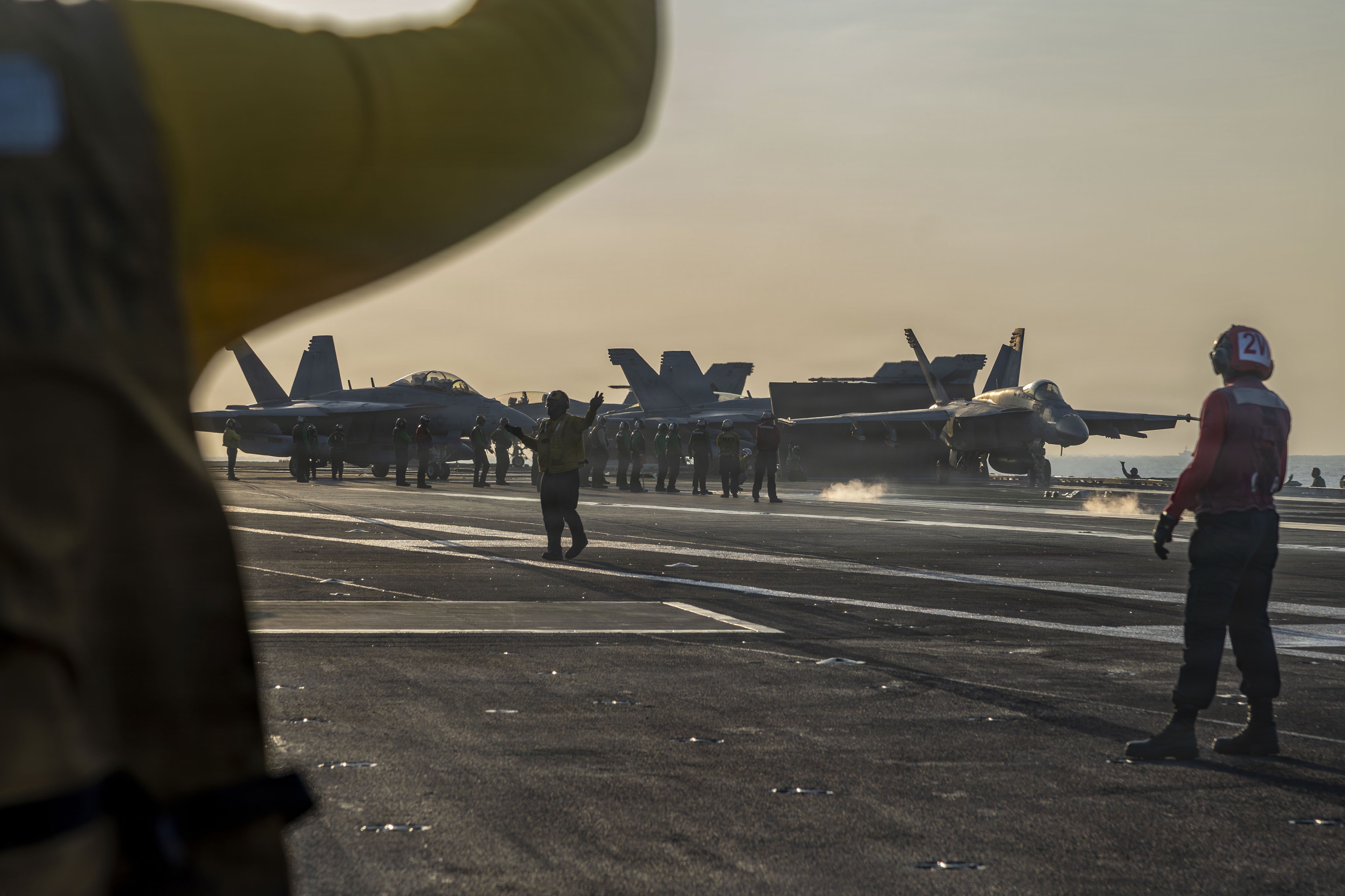 An F/A-18E Super Hornet prepares to launch from the USS Abraham Lincoln in the Arabian Sea late last month.