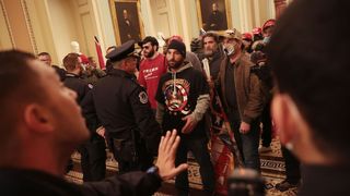 Doug Jensen (center) is shown with a group of rioters inside the Capitol on Jan. 6, 2021. Photo: Win McNamee/Getty Images
