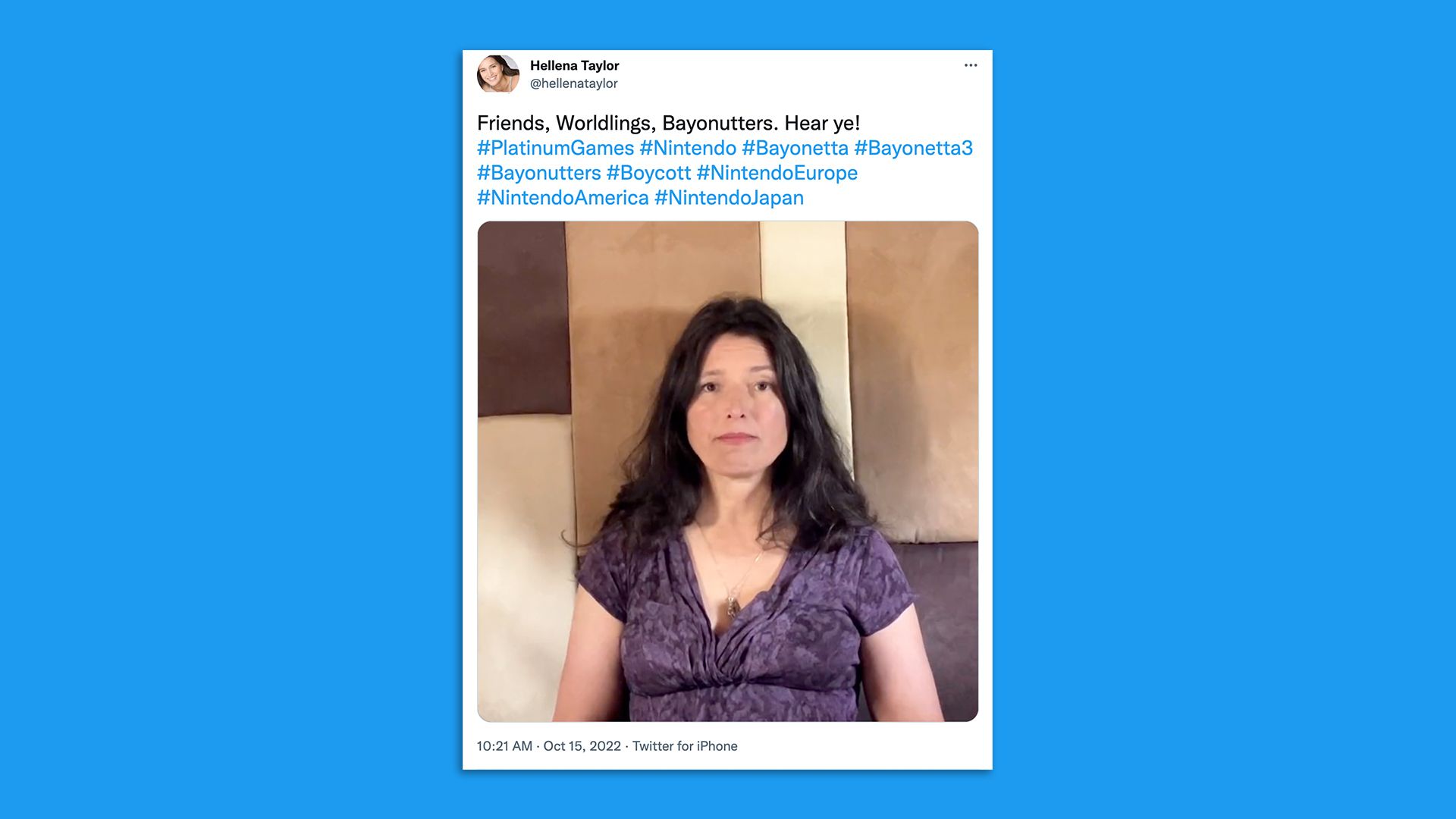Screenshot of a Tweeted video of a woman talking into a camera. Her Tweet includes hashtags for Bayonetta, Platinum Games and Nintendo
