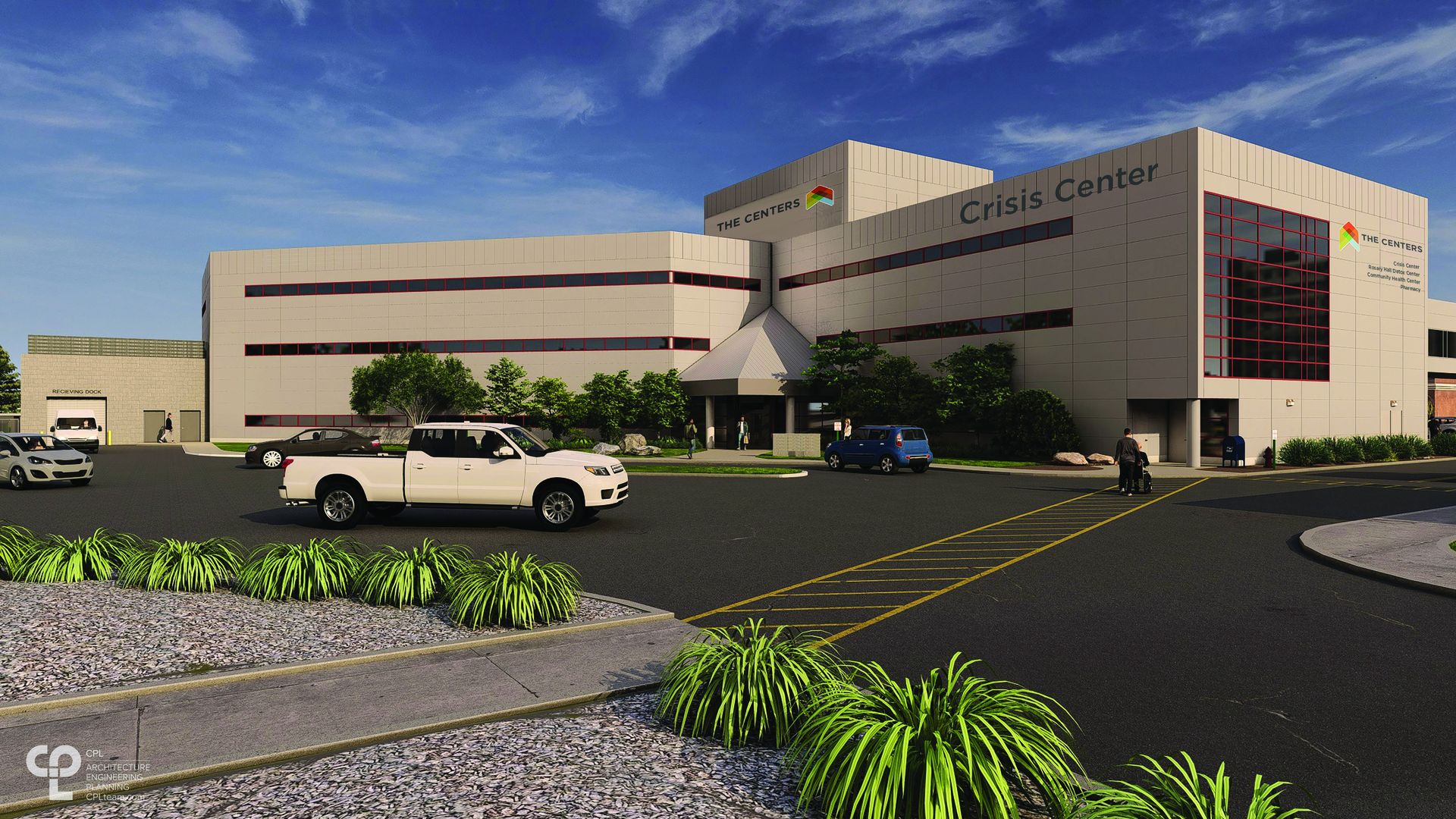 Modern crisis center building with beige panels and red-window accents; sign reads "Crisis Center". Parking lot with cars, green shrubs, and a clear blue sky.
