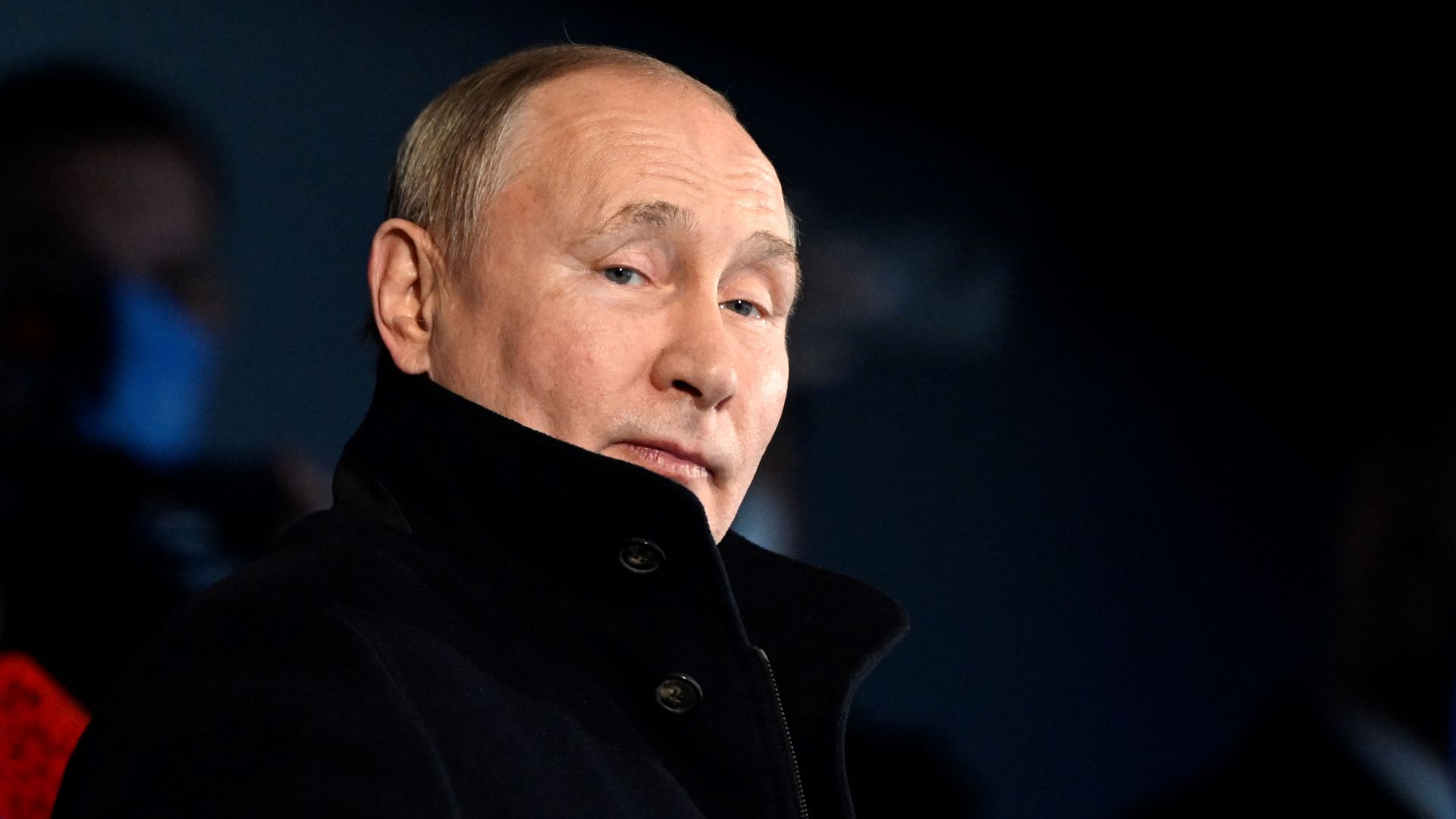 TOPSHOT - Russia's President Vladimir Putin looks on during the opening ceremony of the Beijing 2022 Winter Olympic Games, at the National Stadium, known as the Bird's Nest, in Beijing, on February 4