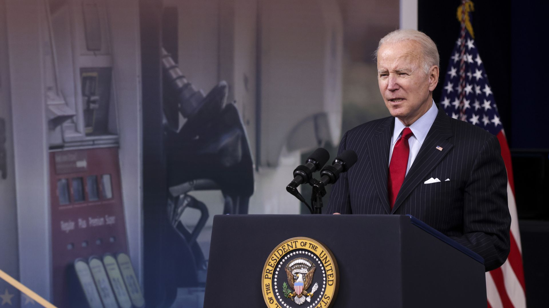 Photo of Joe Biden speaking from a podium with the American flag behind him