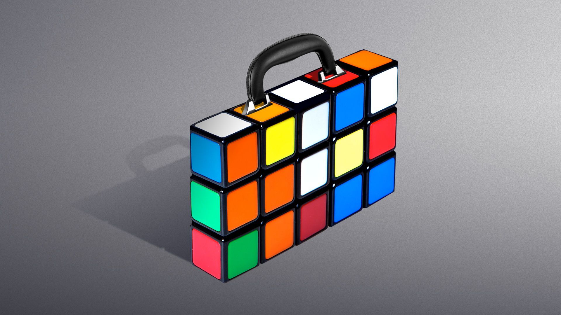 Illustration of a thin, rectangle shaped Rubik's cube stylized as a briefcase.  
