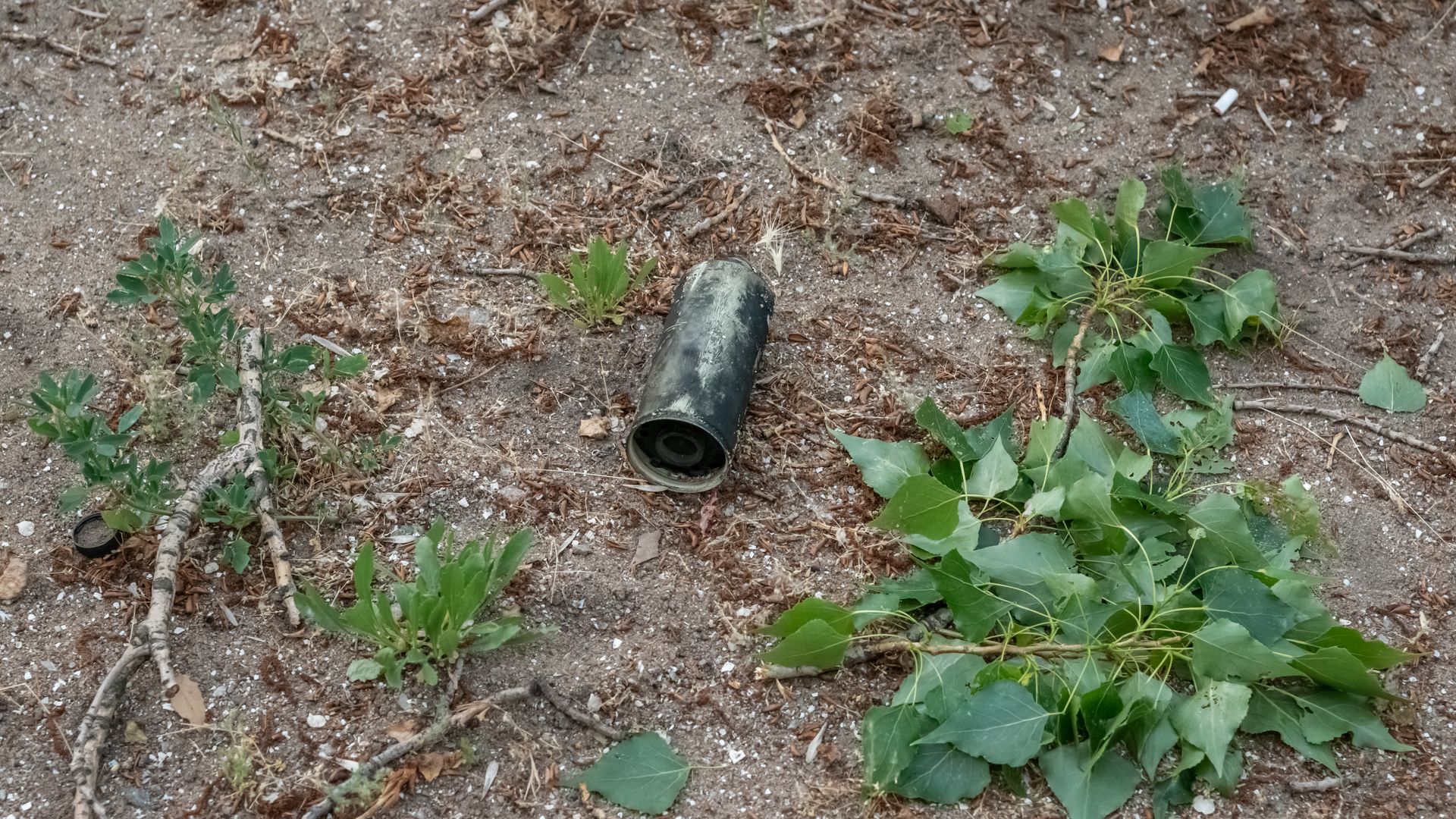 One-of-four parts of a cluster bomb found on the ground in Ukraine