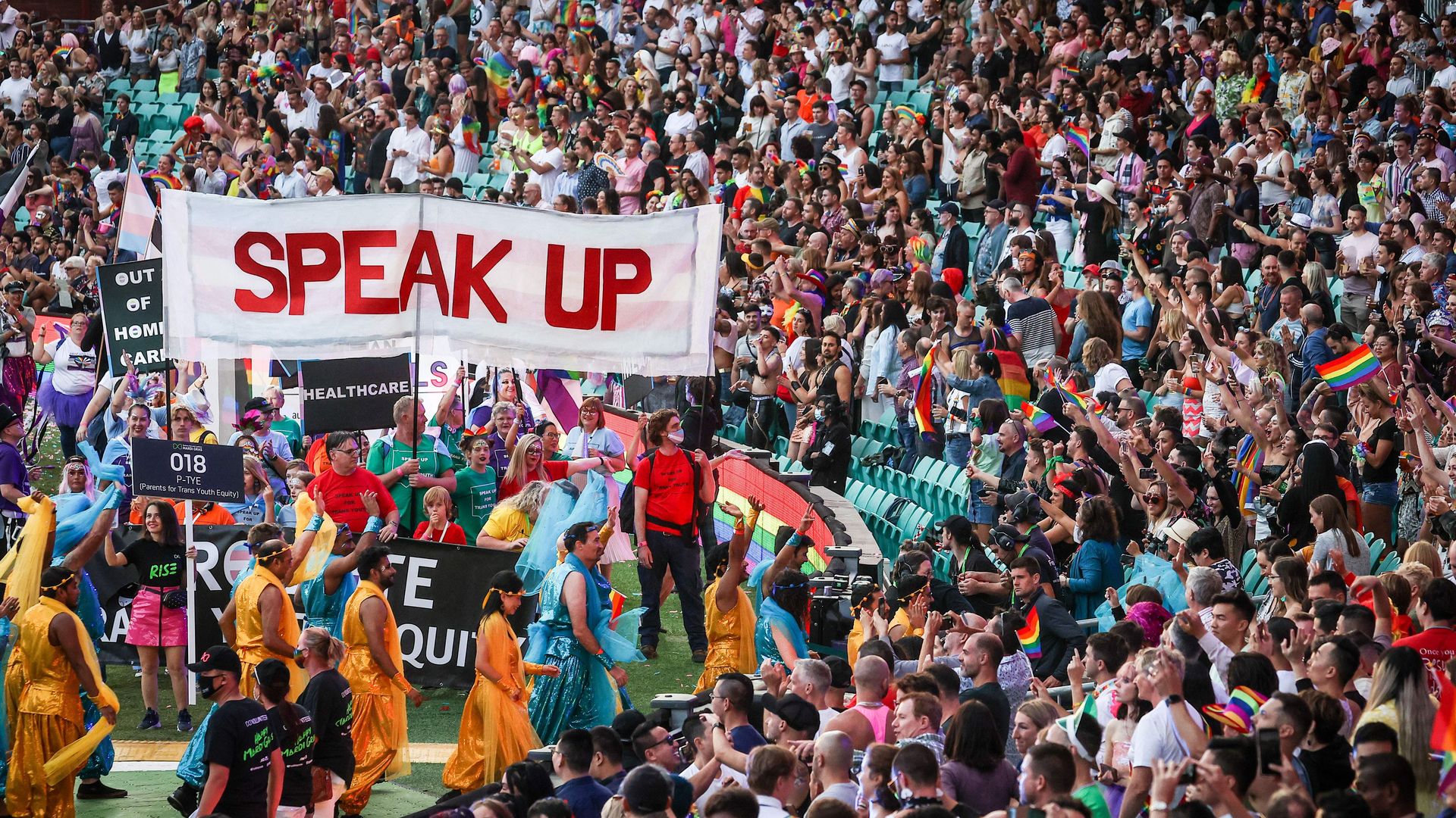 Participants wearing costumes march in the parade during the 43rd Sydney Gay and Lesbian Mardi Gras at the Sydney Cricket Ground (SCG) in Sydney on March 6