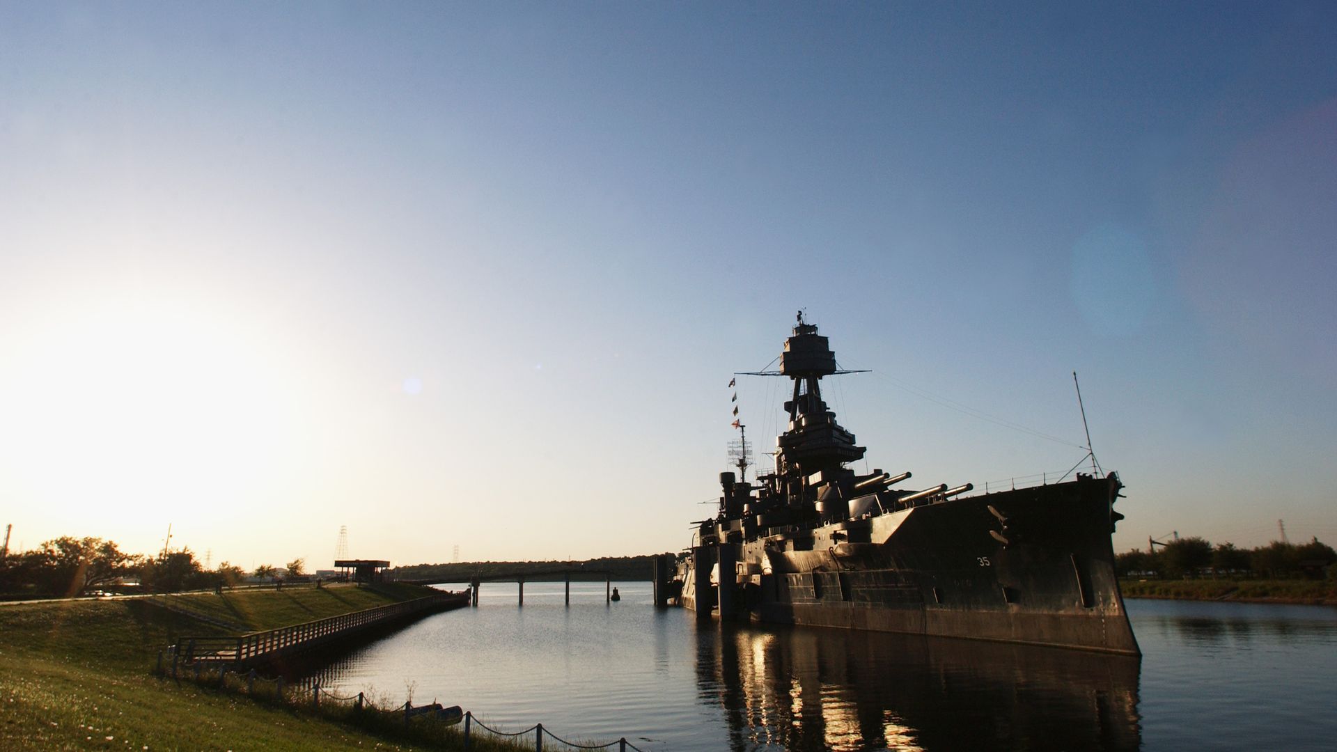 Photo of large battleship floating.
