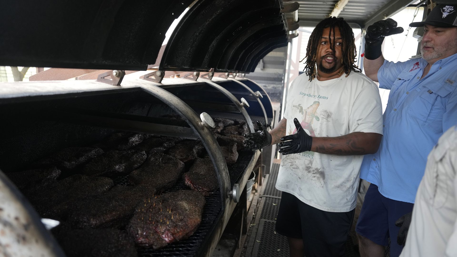 Pitmaster Daniel Penning with a barbecue pit