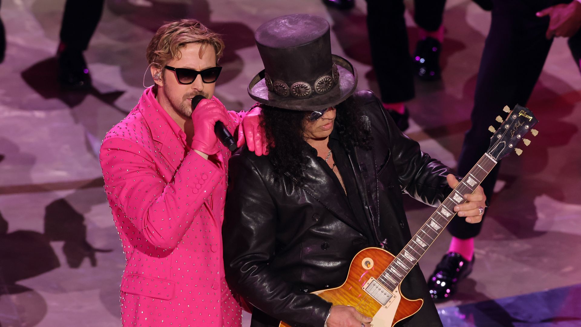 Ryan Gosling and Slash perform 'I'm Just Ken' from "Barbie" onstage during the 96th Annual Academy Awards at Dolby Theatre on March 10, 2024 in Hollywood, California.