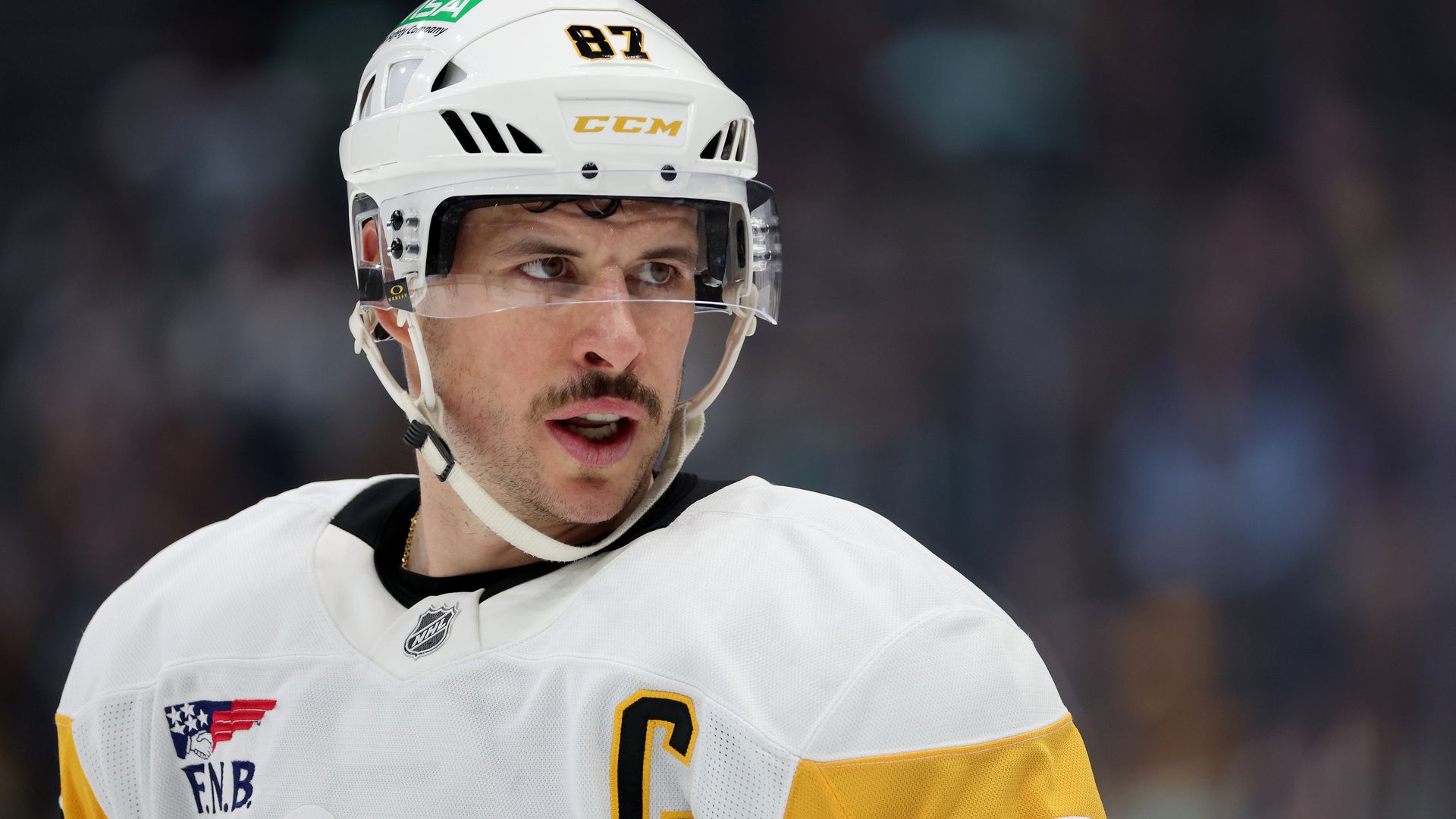Sidney Crosby #87 of the Pittsburgh Penguins looks on during the first period against the Seattle Kraken at Climate Pledge Arena on January 25, 2025 in Seattle, Washington