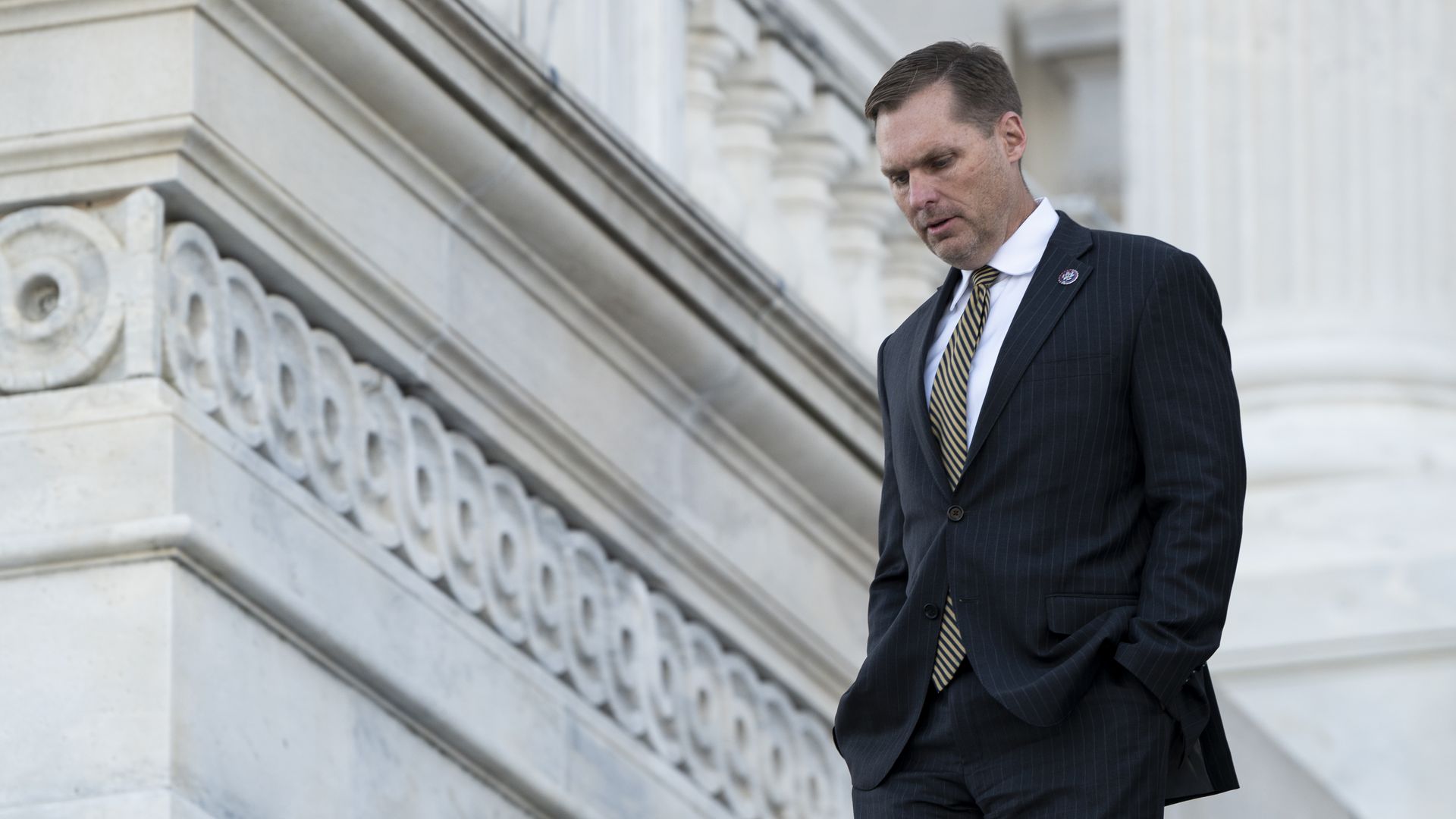 Rep. Michael Guest, R-Miss., walks down the House steps after the vote to censure Rep. Paul Gosar, R-Ariz., on Wednesday, Nov. 17, 2021.